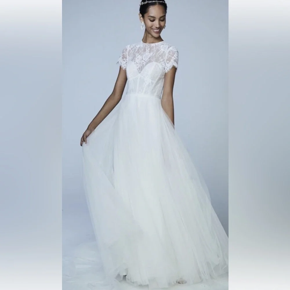 Gorgeous Vowed wedding dress with belt. - Picture 9 of 9